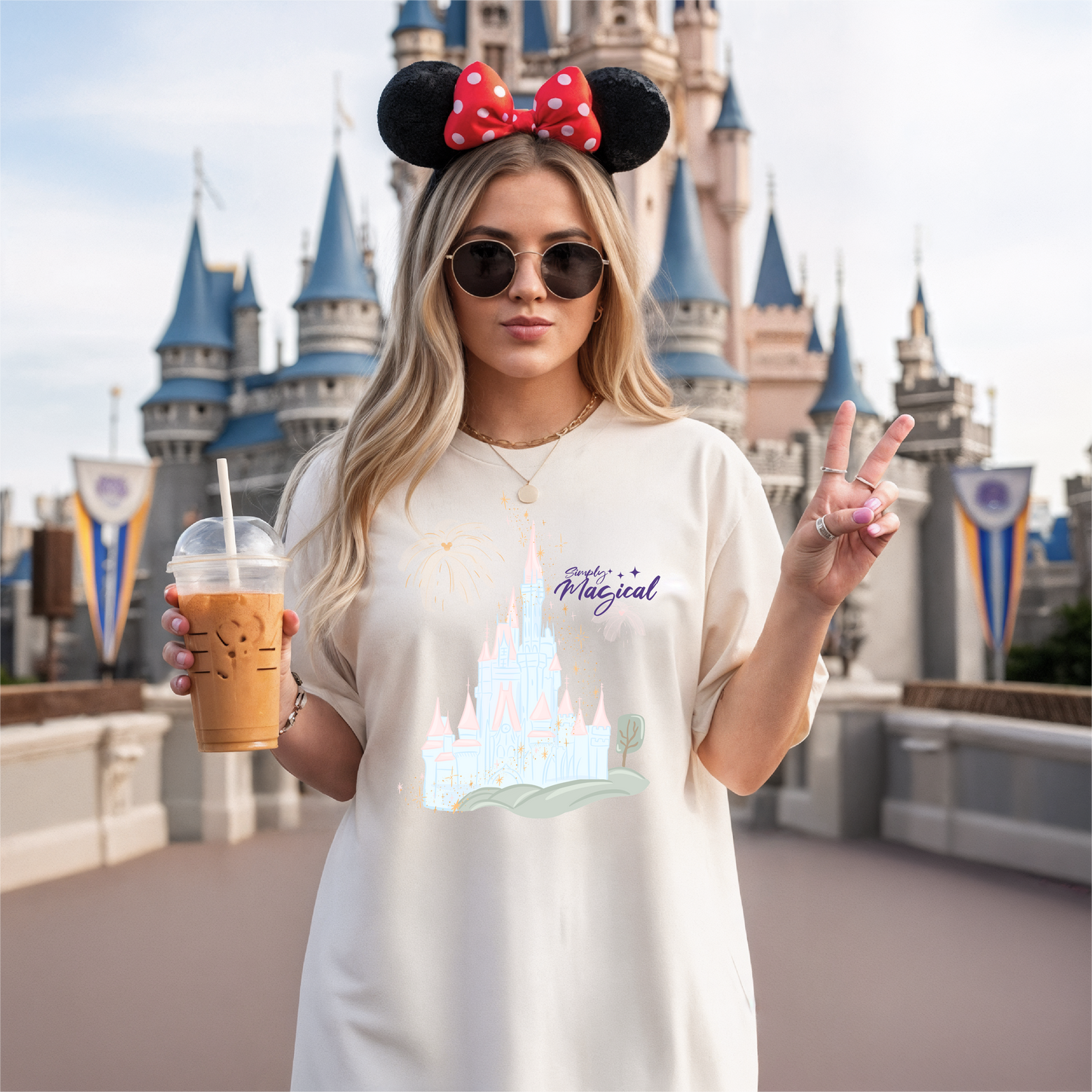 Person wearing Mickey Mouse ears with a castle in the background