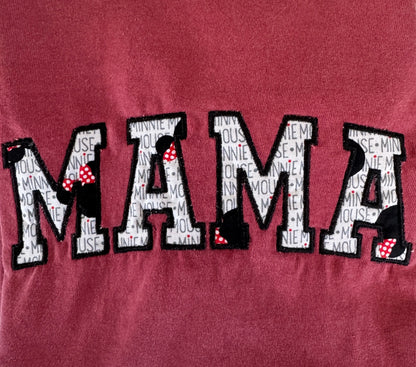 Embroidered MAMA tee with Minnie-inspired letters and polka dot bows on maroon fabric