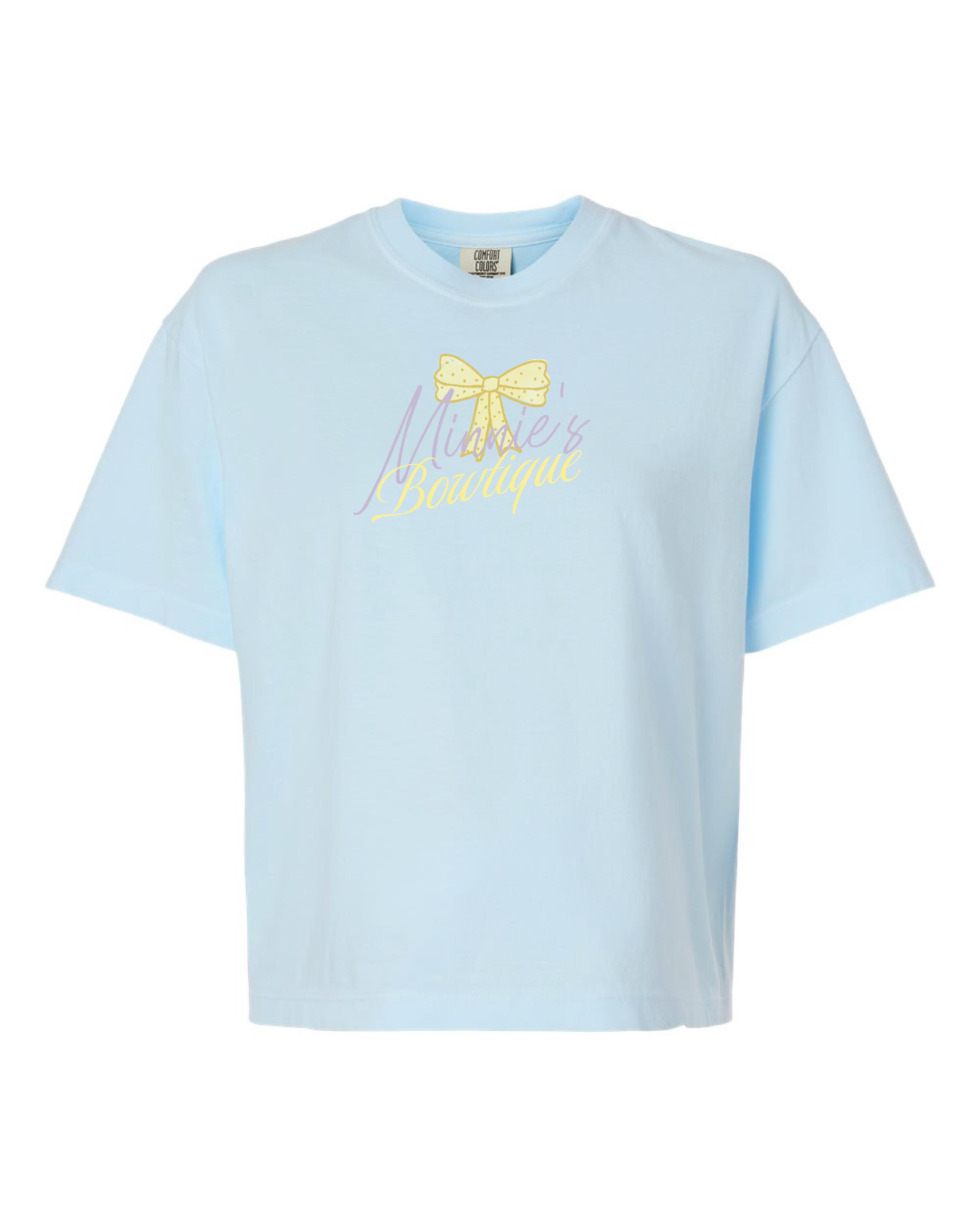 Light blue crop top with yellow bow and 'Minnie’s Bowtique' graphic on the chest
