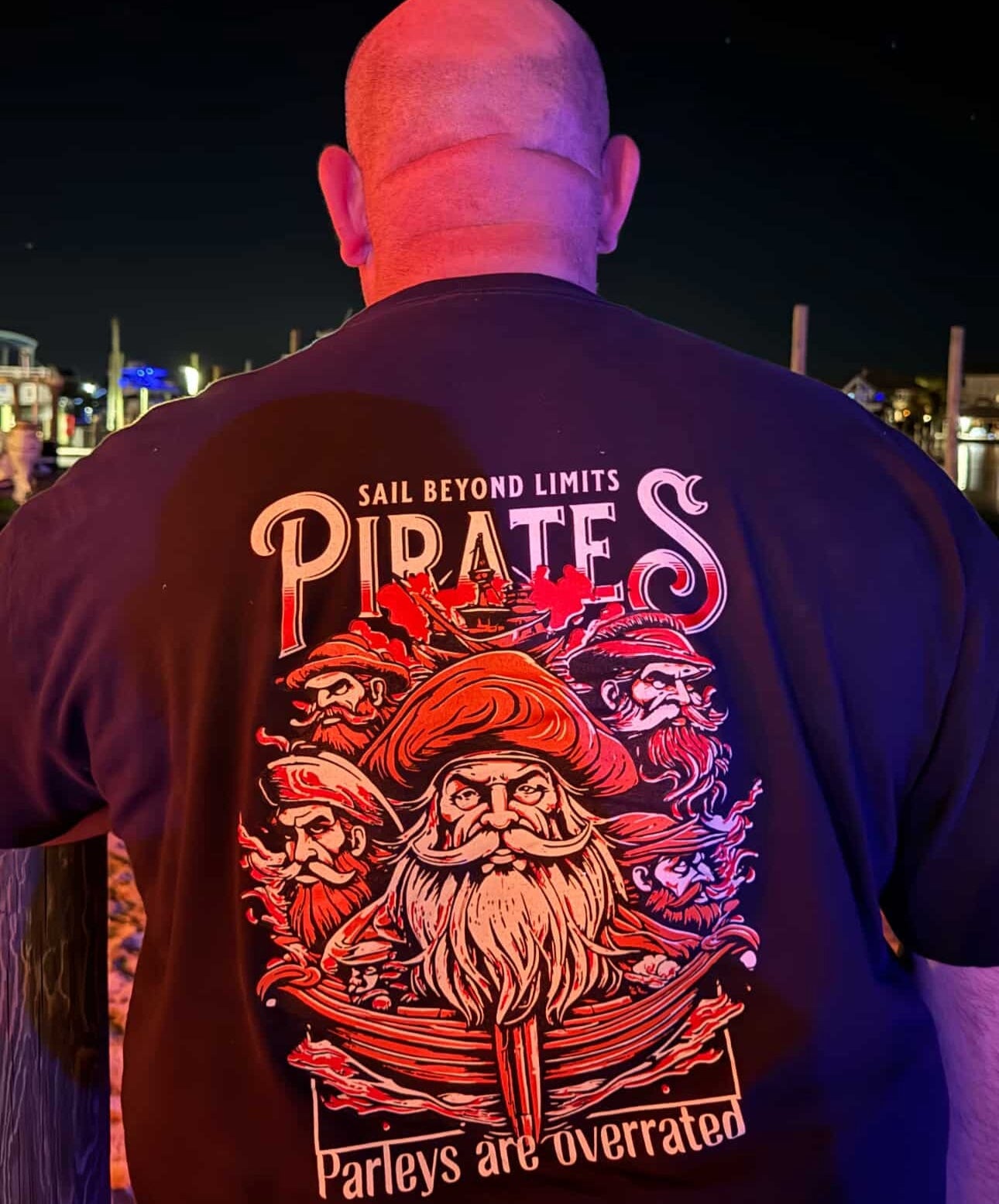 Back graphic of pirate shirt with ship, bearded captain, and nautical theme
