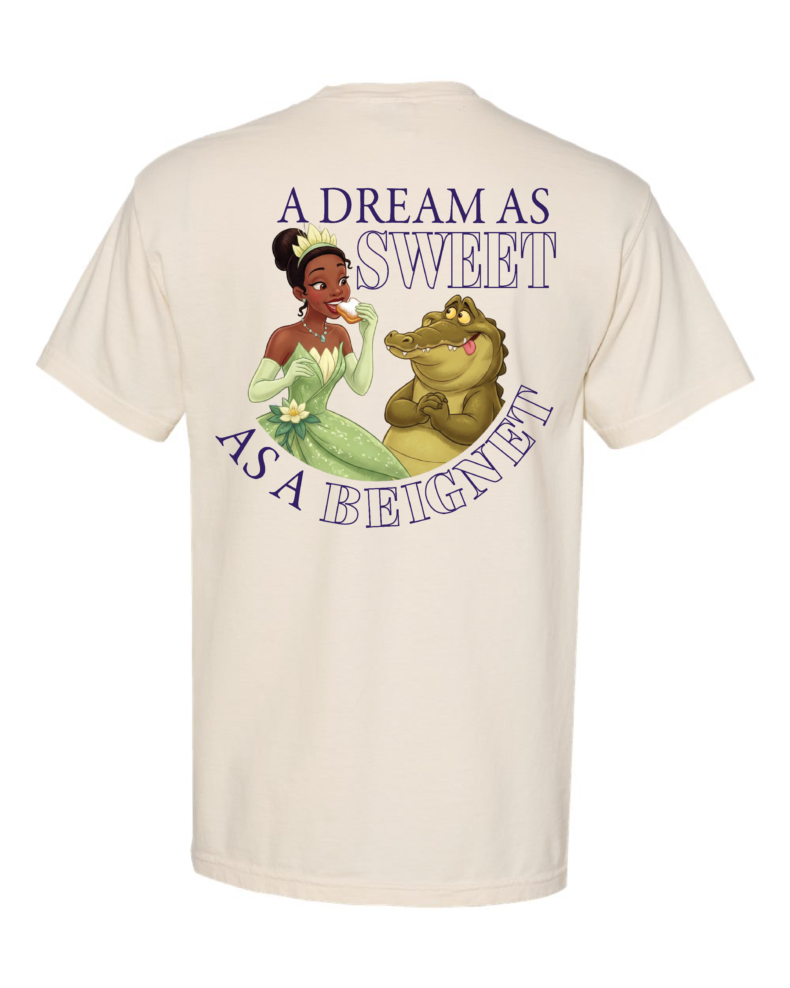 Cream t-shirt with illustrated princess and alligator, text reads 'A Dream As Sweet As A Beignet'