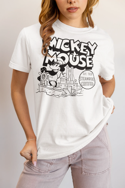 Woman wearing a white vintage Steamboat Mickey Mouse graphic t-shirt with black print.